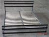 metal bed with wood post